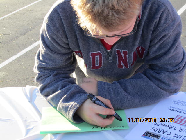 A event participant making a card for our troops